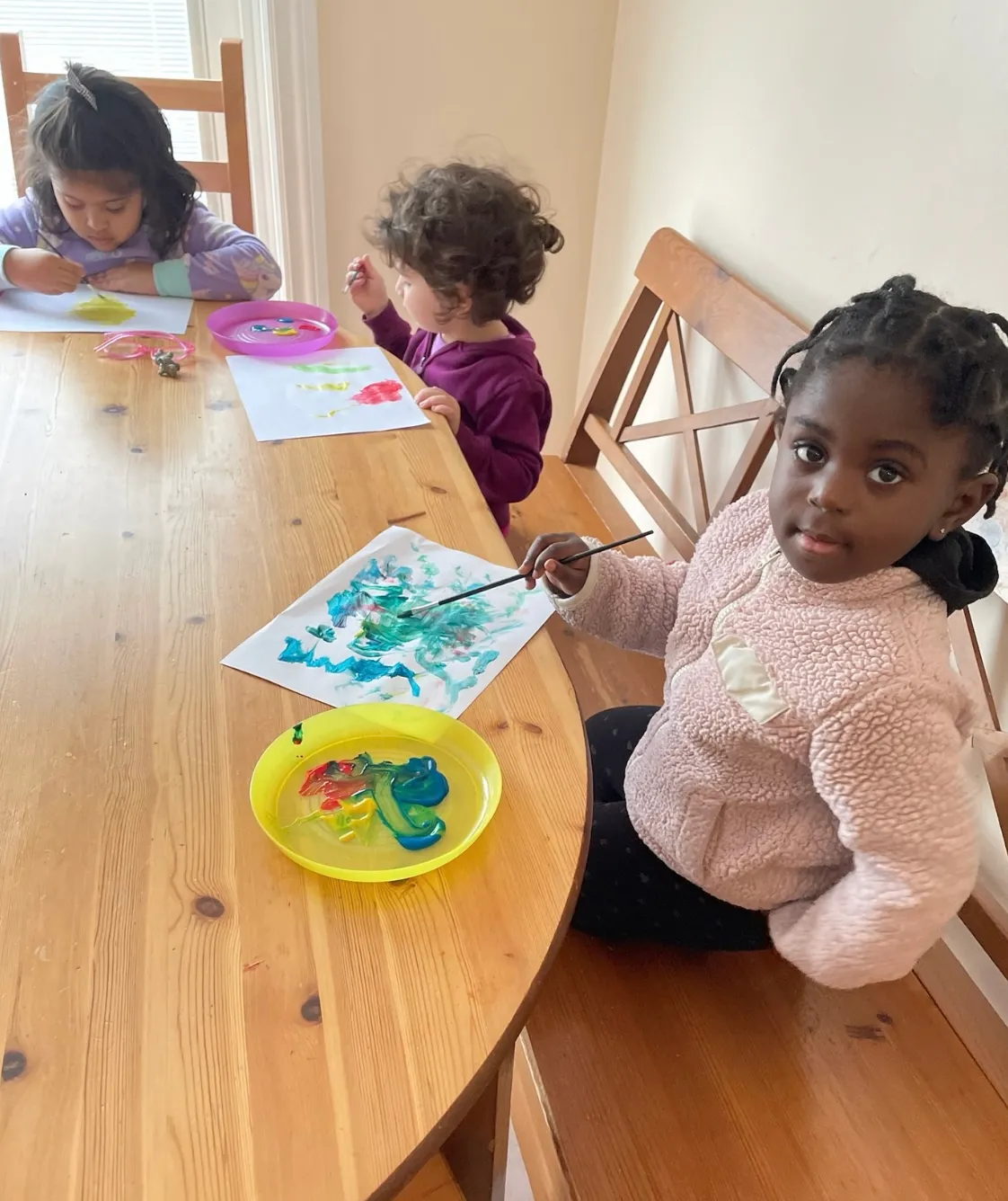 Photo of daycare kids painting
